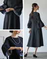A classy and formal look with a black flared dress