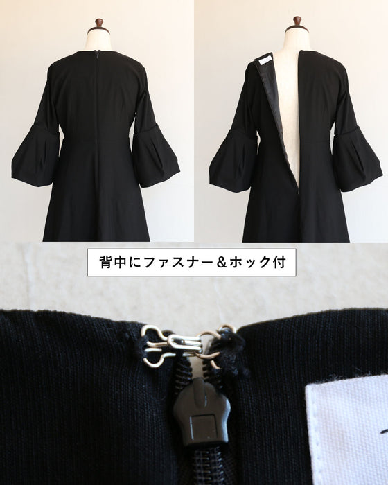 A classy and formal look with a black flared dress