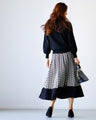 A simple knit with a unique sleeve design that's sure to become a staple in your wardrobe!