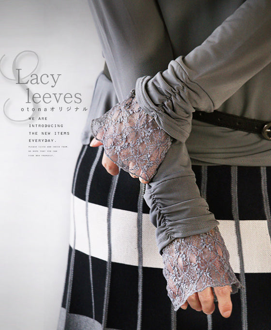 An OTONA original. The soft lace sleeves add a touch of adult sensuality.