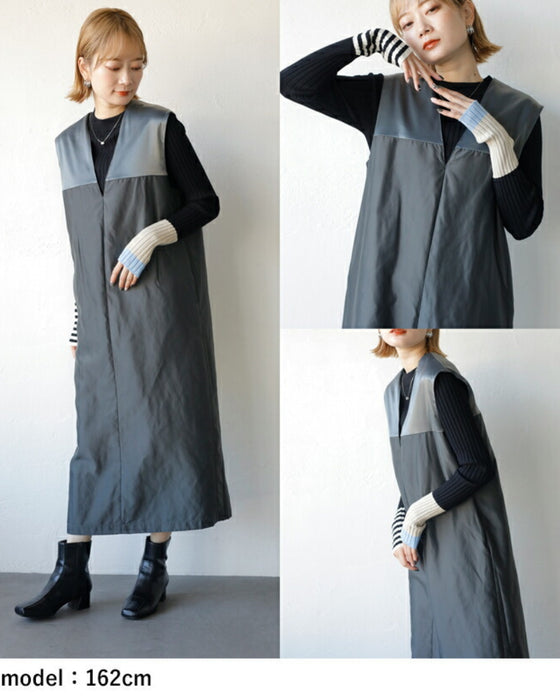 A shiny jumper skirt with a fashionable two-tone design
