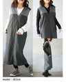 A shiny jumper skirt with a fashionable two-tone design