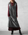 A shiny jumper skirt with a fashionable two-tone design