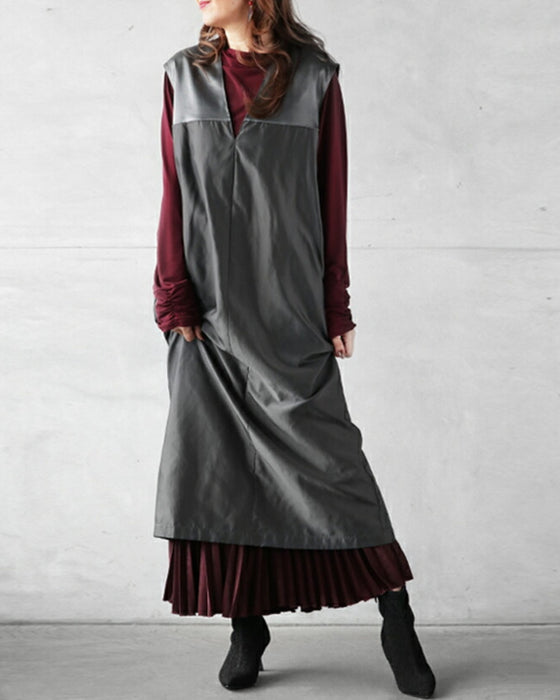 A shiny jumper skirt with a fashionable two-tone design