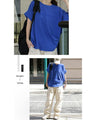 A logo T-shirt with sharp horn sleeves and tucked hem for a sophisticated look