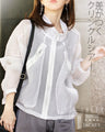 A distinctive crinkle sheer blouson