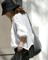 A distinctive crinkle sheer blouson