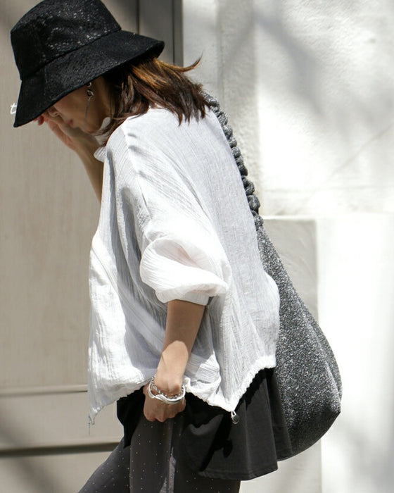 A distinctive crinkle sheer blouson