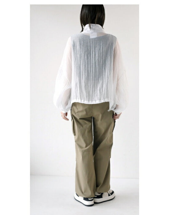 A distinctive crinkle sheer blouson