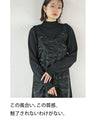 A faux leather jumper skirt with a texture that will charm adults