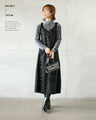 A faux leather jumper skirt with a texture that will charm adults