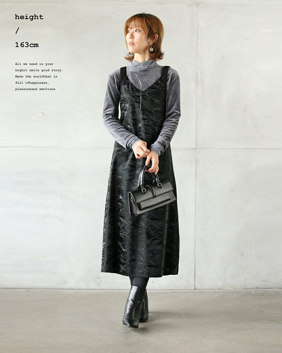 A faux leather jumper skirt with a texture that will charm adults