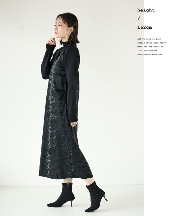 A faux leather jumper skirt with a texture that will charm adults