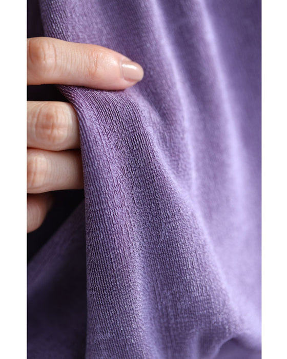 重なるドレープの肩パッド入りカットソートップス