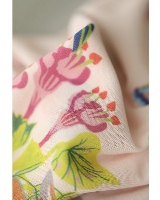 Sheer cut-and-sew top featuring animals and plants living in paradise