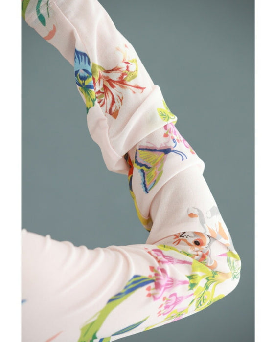 Sheer cut-and-sew top featuring animals and plants living in paradise