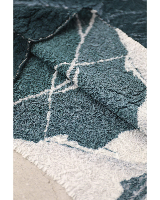 流動的なアート柄の伸びやかドルマンカットソートップス