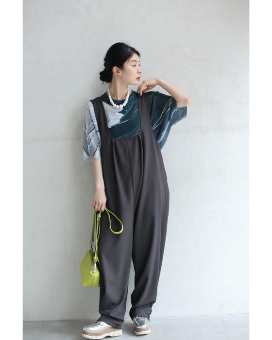 流動的なアート柄の伸びやかドルマンカットソートップス