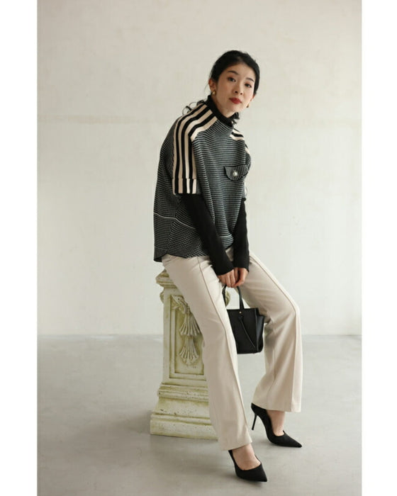 肩に流れるラインの柄ニットプルオーバートップス