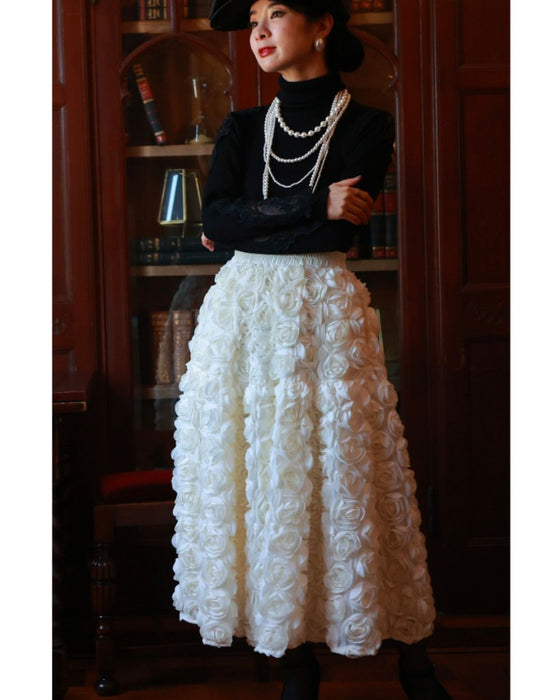 A voluminous bouquet skirt wrapped in rose flowers