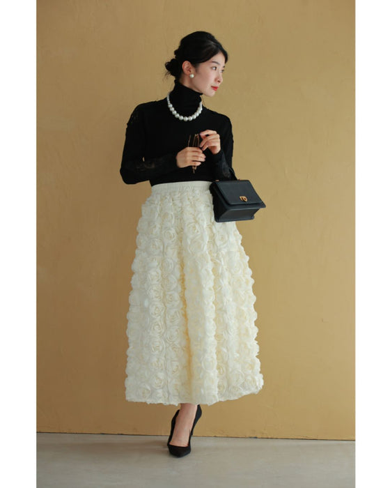 A voluminous bouquet skirt wrapped in rose flowers