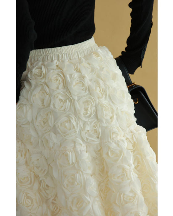 A voluminous bouquet skirt wrapped in rose flowers
