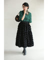 A voluminous bouquet skirt wrapped in rose flowers