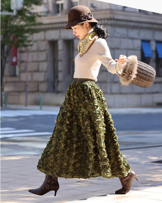 A voluminous bouquet skirt wrapped in rose flowers