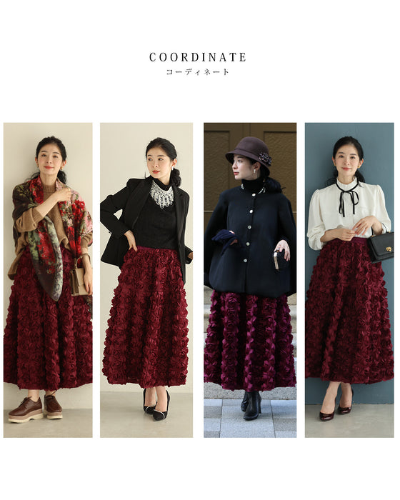 A voluminous bouquet skirt wrapped in rose flowers