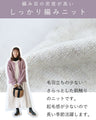 A dense and warm cardigan with a hem