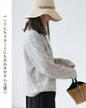 A thin cardigan with delicate floral embroidery