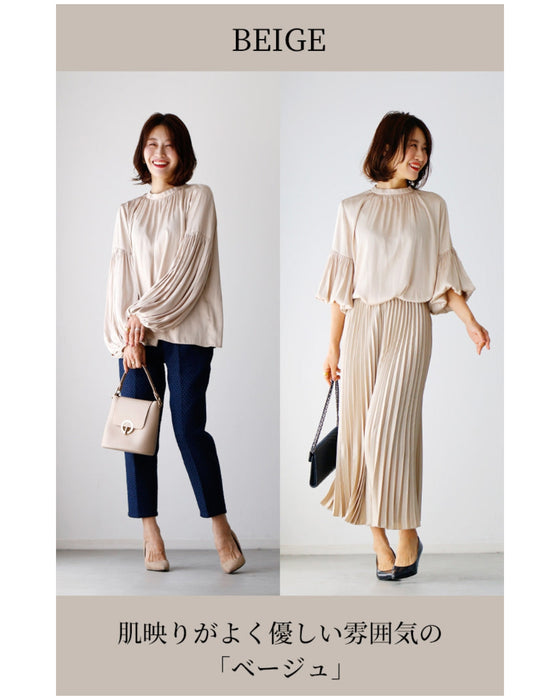 A glossy shirred blouse with 3/4 sleeves and long sleeves for a stylish look