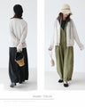 A thin cardigan with delicate floral embroidery