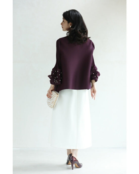 パールを纏う花袖のプリーツプルオーバートップス