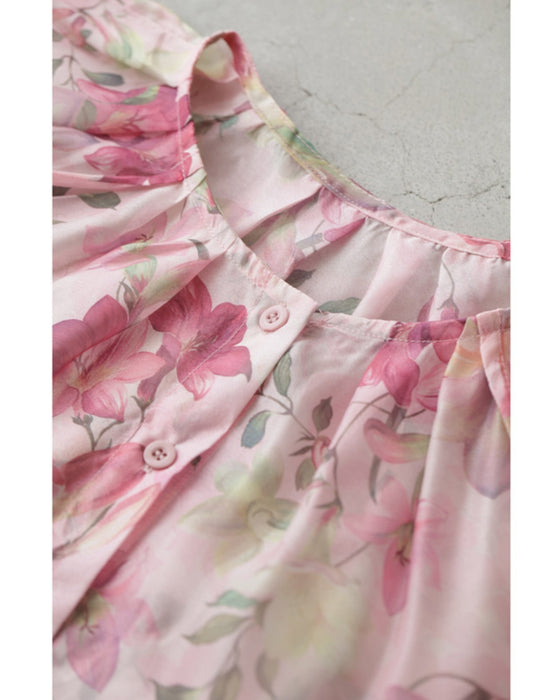 愛らしいピンクの花が微笑むエアリーなシアーチュニック