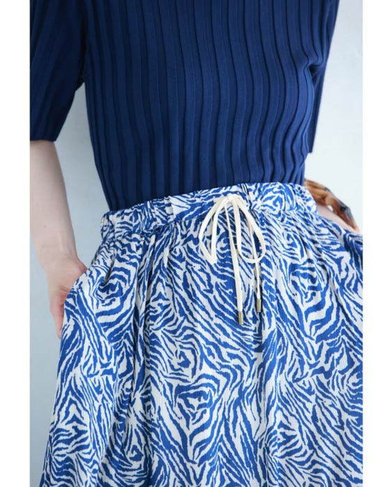 (Petticoat included) A cool and refreshing long skirt with an animal print