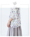 Coloring top with flared sleeves and flowers