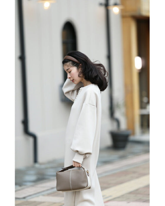 艶めくパールが流れるロングワンピース