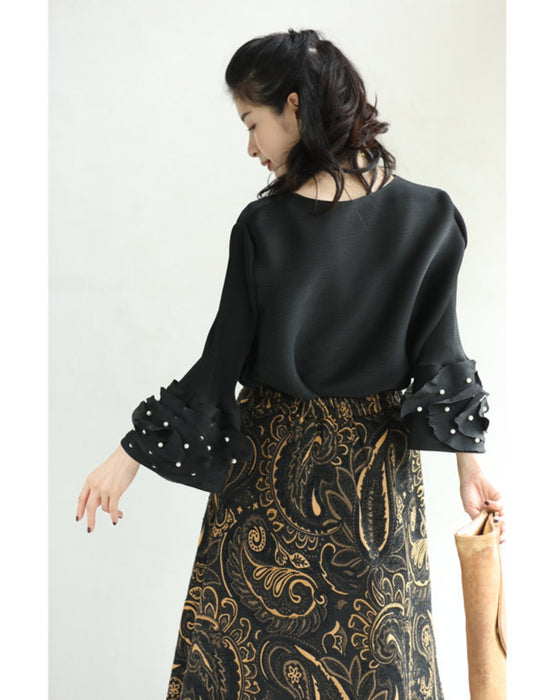 パールを纏う花袖のプリーツプルオーバートップス