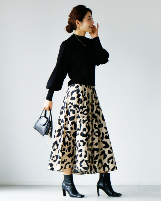A feminine, evolved version of the turtleneck knit