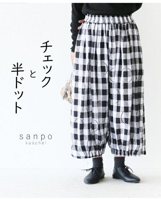Check and half-polka dot pants