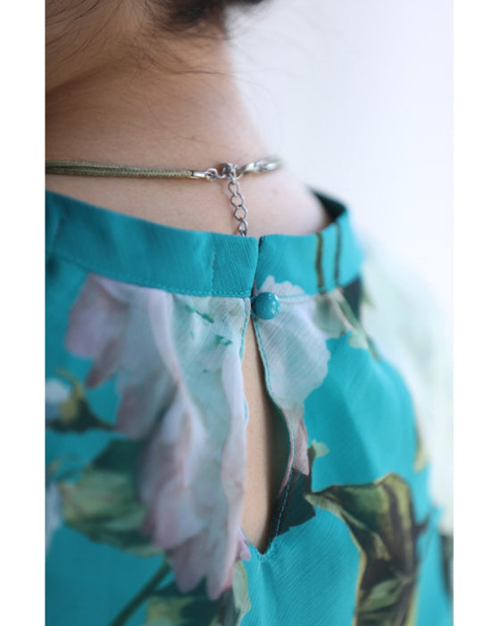 透明感溢れるシアーな花画ミニワンピース