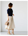 Tops that match skirts to create a slim waist