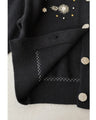 Knitted cardigan with flowers drawn with beads and jewels