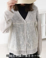 A thin cardigan with delicate floral embroidery