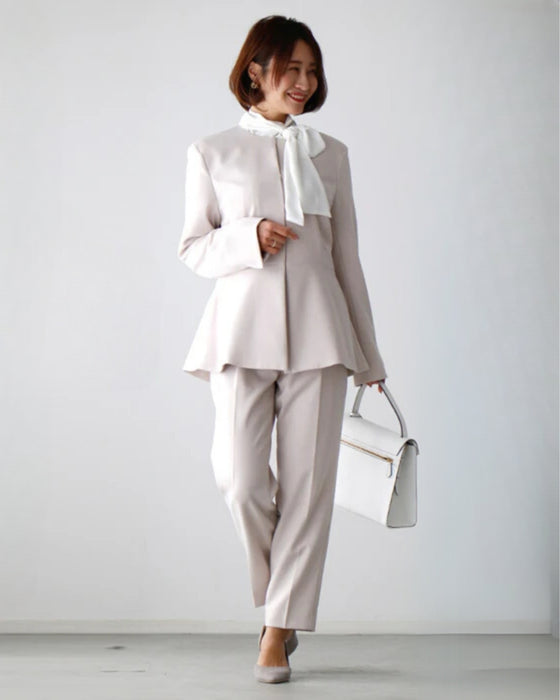 女性らしく細く見せるペプラムスーツ