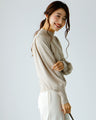 A feminine, evolved version of the turtleneck knit