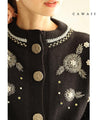 Knitted cardigan with flowers drawn with beads and jewels