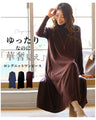 A loose, slender-looking long knit dress