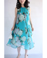 A sheer floral mini dress with a translucent feel